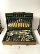 A OAK CANTEEN OF MIXED PLATED CUTLERY.