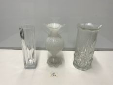 TWO CLEAR GLASS VASES, ONE WITH DECORATION, 25 CMS, AND A SWAN NECK GLASS VASE, A/F.