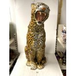 A LARGE TERRACOTTA FIGURE OF A CHEETAH, MADE IN ITALY, 84 CMS.