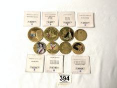 TEN GOLD PLATED COMMEMORATIVE COINS - VARIOUS.