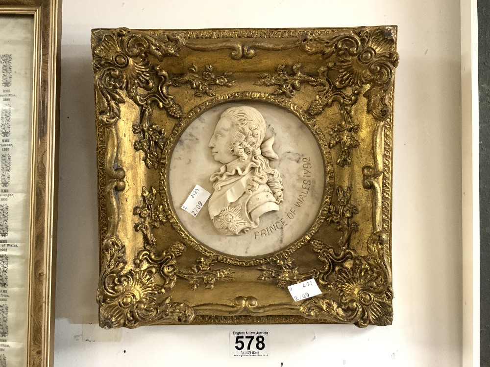 A REPRODUCTION RESIN BUST OF PRINCE OF WALES 1792, IN GILT FRAME, 14 CMS DIAMETER.