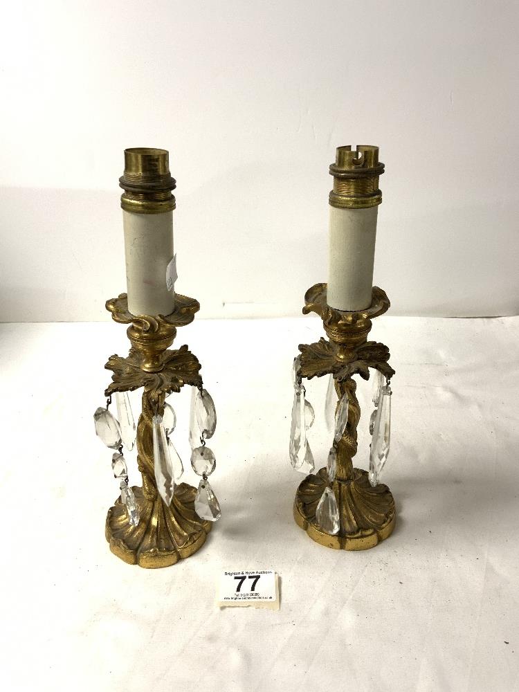 A PAIR OF 19TH-CENTURY GILT METAL TWIST COLUMN LUSTRES CONVERTED TO LAMPS FOR ELECTRICITY, 28 CMS.