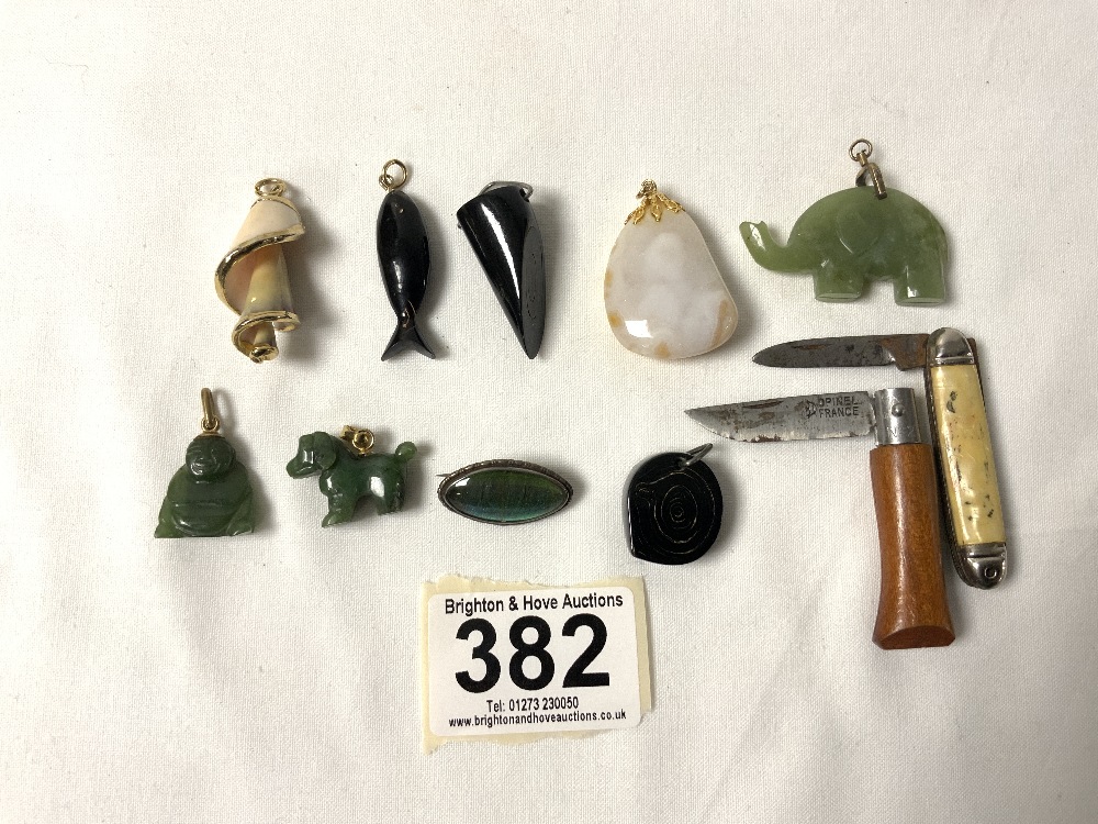 TWO JADE ANIMAL PENDANTS, BUTTERFLY WING BROOCH, PENDANTS, TWO POCKET KNIVES AND MORE.