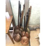 EIGHT VICTORIAN COPPER AND BRASS BED PANS