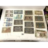 A QUANTITY OF BANK NOTES - INCLUDES TWO BANK OF BIAFRA ONE POUND NOTES, TWO 10000 LIRE NOTES, OLD