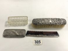 A SILVER TOP GLASS PIN JAR, AND FOUR HALLMARKED SILVER BACKED BRUSHES AND A COMB.