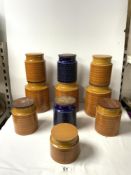 EIGHT HORNSEA SAFFRON PATTERN KITCHEN STORAGE JARS AND TWO BLUE HORNSEA STORAGE JARS.