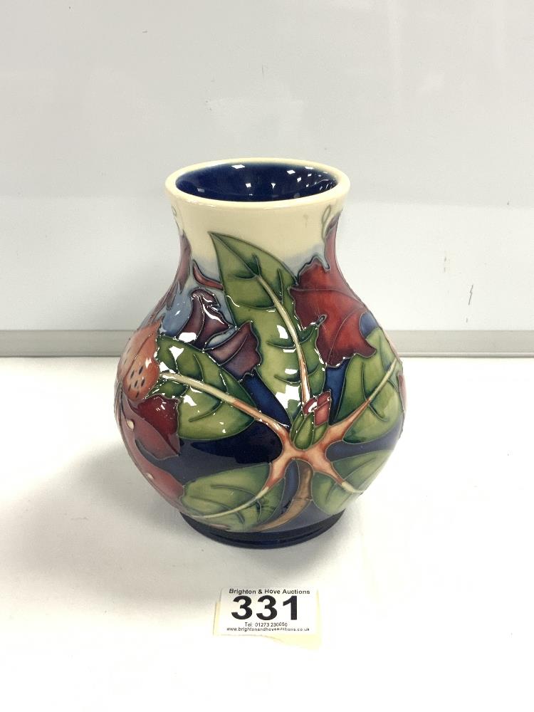 A MOORCROFT SIMEON PATTERN VASE, DESIGNED BY PHILIP GIBSON, 15 CMS.