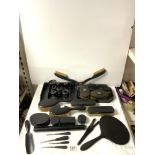 A QUANTITY OF EBONISED DRESSING TABLE ITEMS.