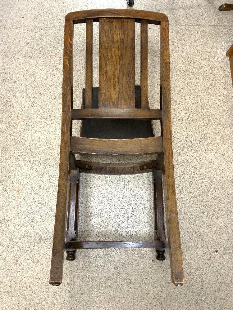 A 1940s OAK DINING SUITE WITH CARVED HEAD MOTIFS DECORATION - INCLUDES A DRAW LEAF TABLE, FOUR - Image 3 of 12