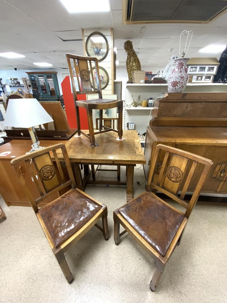 A 1940s OAK DINING SUITE WITH CARVED HEAD MOTIFS DECORATION - INCLUDES A DRAW LEAF TABLE, FOUR - Image 2 of 12