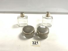 TWO PAIRS OF HALLMARKED SILVER TOP SCENT BOTTLES AND JARS, BIRMINGHAM 1937.
