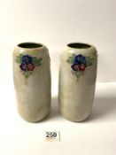 PAIR OF ROYAL DOULTON GLAZED STONEWARE CYLINDRICAL VASES; DECORATED TUBE LINED FLORAL SPRAYS, THE