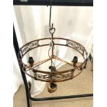 A CIRCULAR ARTS AND CRAFTS COPPER OXIDISED RISE AND FALL CHANDELIER, 47CMS DIAMETER.