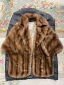 A VINTAGE BROWN FUR LADIES STOLE FROM HARRODS MADE BY GROSVENOR CANADA WITH PROTECTIVE SLEEVE