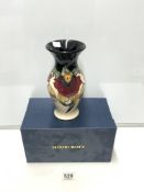 A MOORCROFT ANNA LILY VASE, 23 CMS, WITH BOX.