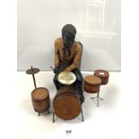 A PLASTER MODEL OF A BLACK DRUMMER.