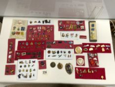 A QUANTITY OF BADGES VARIOUS SUBJECTS - TRAINS, FOOTBALL, DISNEY , COMMEMORATIVE AND MORE.