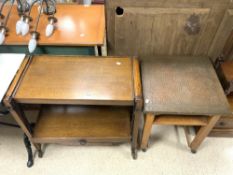 A 1930s OAK ADJUSTABLE TEA TROLLEY AND A SQUARE OAK TABLE WITH BEATEN COPPER TOP, 50 CMS SQUARE.