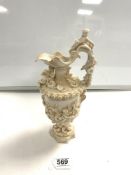 ROYAL RUDOLSTADT EWER DECORATED WITH PUTTI, A FAWN AND DOLPHINS MARK R.W TO BASE 32CM