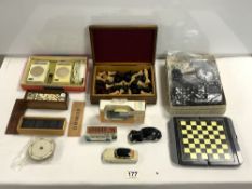 TWO SETS OF DOMINOS, LOOSE DOMINOS, CHESS SET, TOY VEHICLES, CIRCULAR PLAYING CARDS AND MORE.