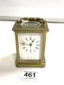 A FRENCH BRASS CARRIAGE TIMEPIECE, WITH WHITE ENAMEL DIALAND ROMAN NUMERALS.