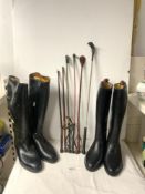 TWO PAIRS OF RIDING BOOTS SIZE 7, AND 46, AND SIX RIDING CROPS.