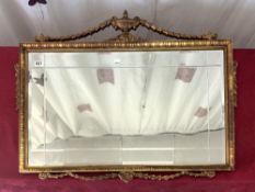 A GILT FRAMED ADAM STYLE BEVELLED WALL MIRROR, 86X50.