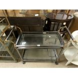 A MODERN CHROME AND BRASS AND GLASS 2 TIER DRINKS TROLLEY.
