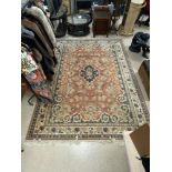 A PERSIAN PATTERN WOOLLEN CARPET MADE IN KARACHI, 340X250.CMS.