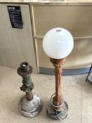 A SMALL GARDEN LAMP POST WITH GLASS GLOBE, 100 CMS.