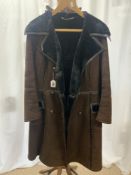 A BROWN SUEDE FAUX FUR LINED COAT BY - WESTMANS OF SOMERSET.