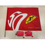 A FERRARI FLAG AND TWO FERRARI BUM BAGS.