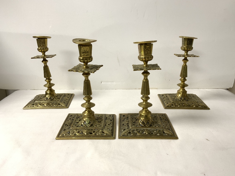 A SET OF FOUR VICTORIAN (CAST BRASS) PIERCED SQUARE CANDLESTICKS, 18 CM. - Image 2 of 3