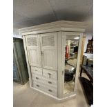 A LATE VICTORIAN PAINTED BREAKFRONT COMPACTUM WARDROBE WITH MIRRORED DOORS AND FOUR DRAWERS, WITH