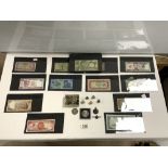 A QUANTITY OF WORLD BANK NOTES - AMERICAN DOLLARS AND MORE, AND A SILVER AND ENAMEL RAC BROOCH,