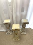 THREE CLASSICAL DESIGN GOLD DECORATED FLUTED COLUMNS, 58CMS.