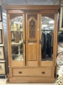 A LATE VICTORIAN SATIN WALNUT WARDROBE, WITH TWO MIRRORED DOORS AND DRAWER UNDER, WITH CARVED