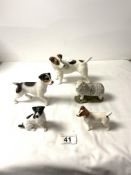 A SMALL BESWICK JACK RUSSELL, THREE OTHER DOG FIGURES AND A SHEEP.