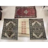 FOUR VINTAGE RUGS, INCLUDING A MATCHING PAIR.