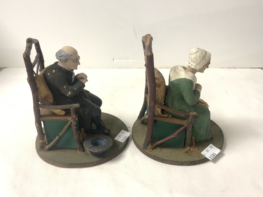 A PAIR OF WOODEN AND COMPOSITE NODDING FIGURES OF ELDERLY MAN AND LADY IN CHAIRS. - Image 3 of 4