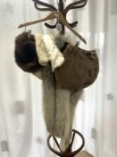 TWO FUR STOLLS, FUR HAT AND FUR MUFF HAND BAG.