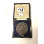 A BRONZE MEDALLION - THE SIR CUTHBERT GRUNDY MEDAL, FOR PROFIENCY AT THE FINAL EXAMINATION OF