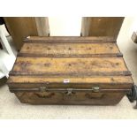 A VINTAGE STEEL TRAVEL TRUNK WITH FOUR HANDLES AND BRASS LOCKS, 86X54.