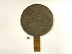 A JAPANESE BRONZE MIRROR WITH RELIEF OF CRANES, 28 CMS DIAMETER.