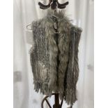 A LADIES SILVER FUR WAISTCOAT.