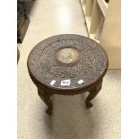 INDIAN CARVED CIRCULAR OCCASIONAL TABLE ON ELEPHANT LEGS, 44CMS DIAMETER.