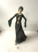 A RESIN REPRODUCTION ART DECO STYLE FIGURE OF A LADY, 44CMS. [AF].