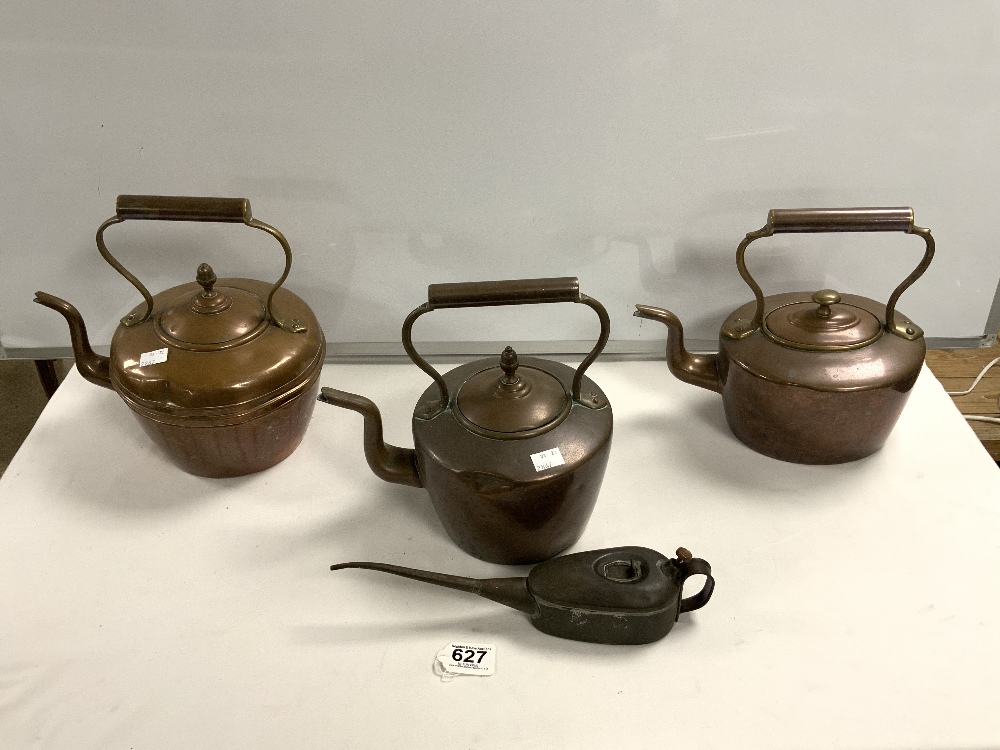 THREE VICTORIAN COPPER KETTLES, AND OLD TIN OIL DISPENSER.