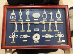 FRAMED AND GLAZED CASED OF EXAMPLES OF ROPE KNOTS 60 X 40